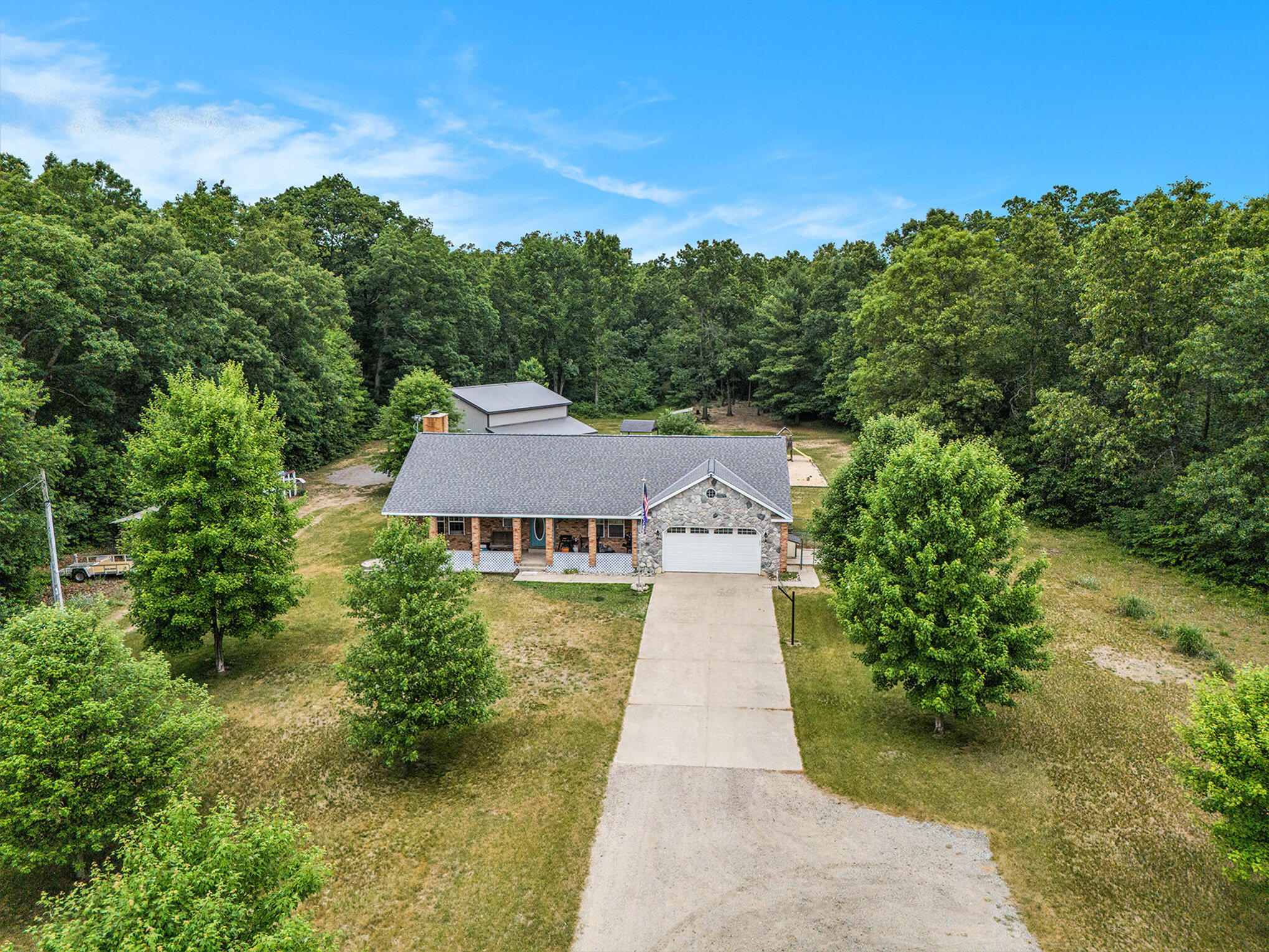 1088 East McKinley Road Rothbury, MI 49452 - Photo 3 of 49 003_dji_20250625110401_0293_d_827