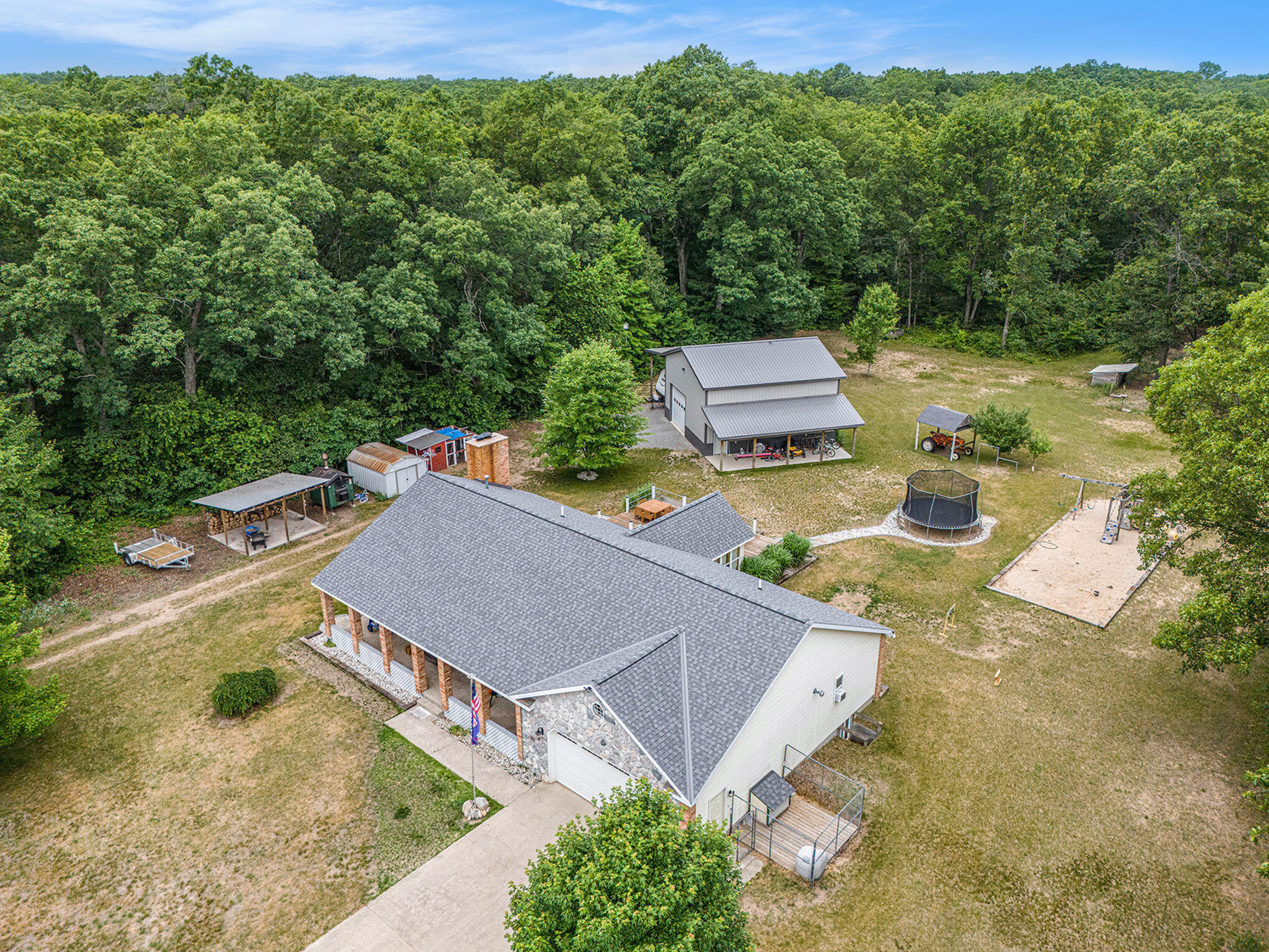 1088 East McKinley Road Rothbury, MI 49452 - Photo 4 of 49 004_dji_20250625111158_0306_d_866