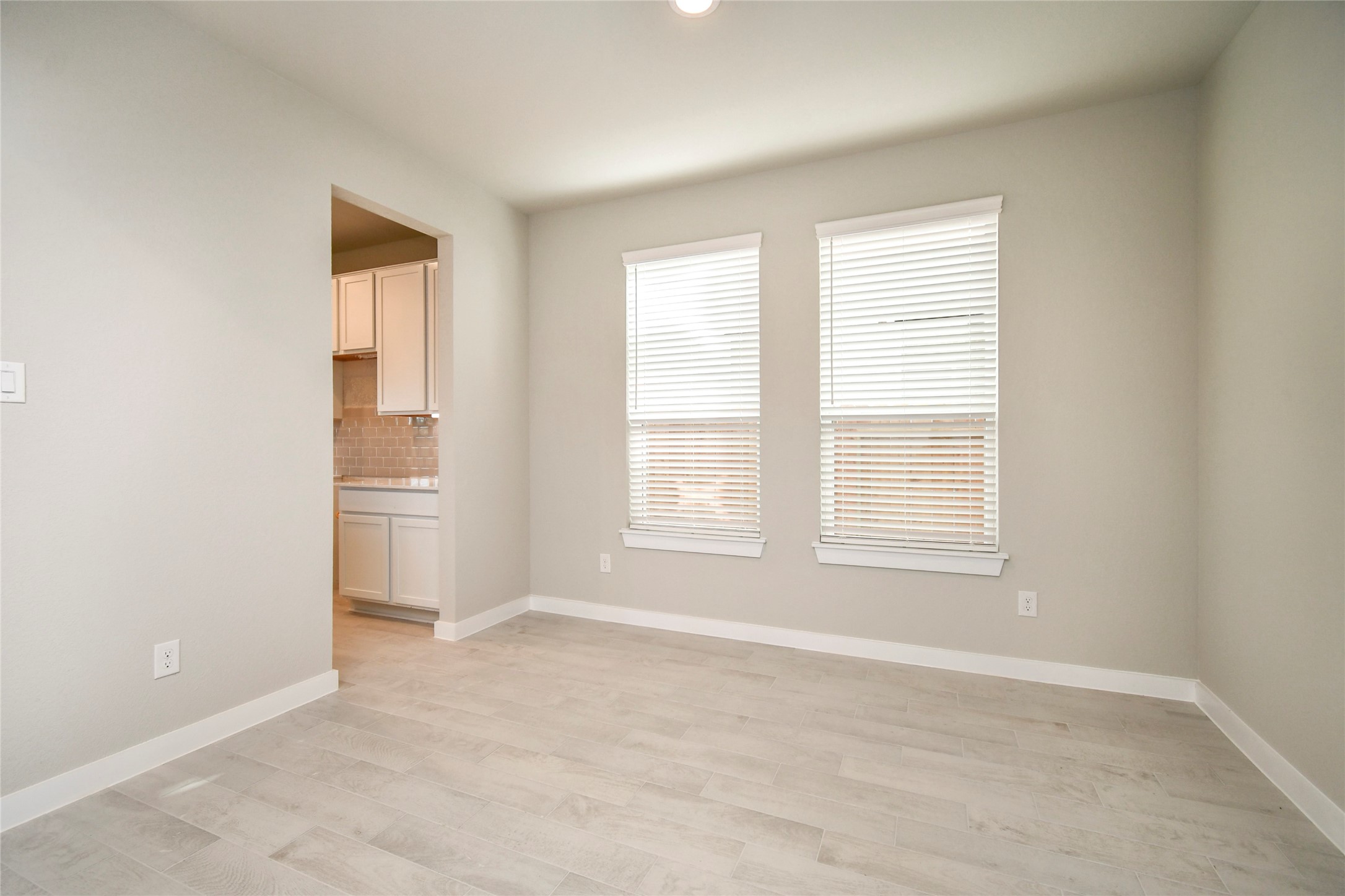 15203 Statice Trail Houston, TX 77044 - Photo 9 of 21 a view of an empty room with a window