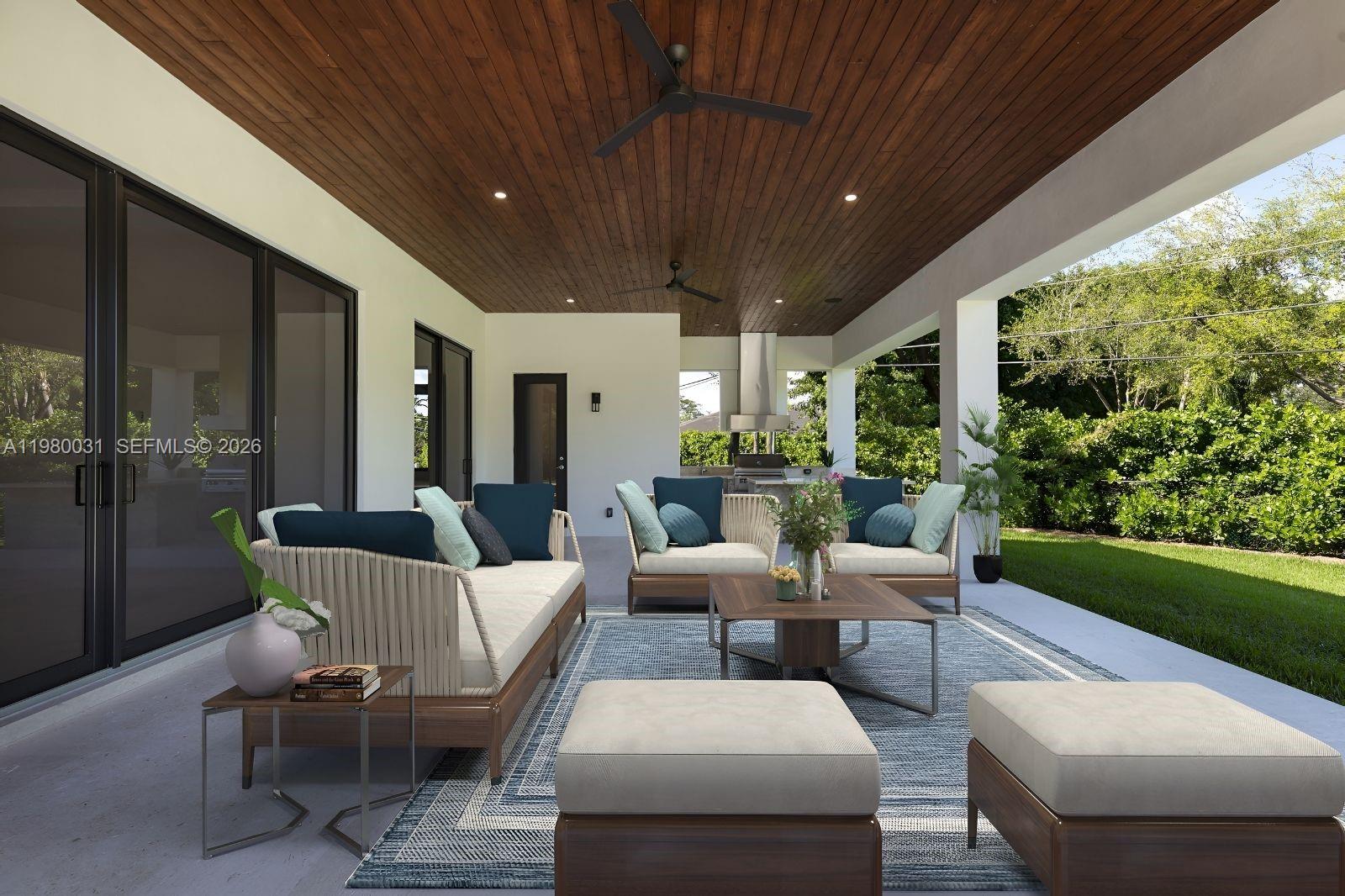 6065 Southwest 109th Street Pinecrest, FL 33156 - Photo 16 of 28 a outdoor space with patio furniture