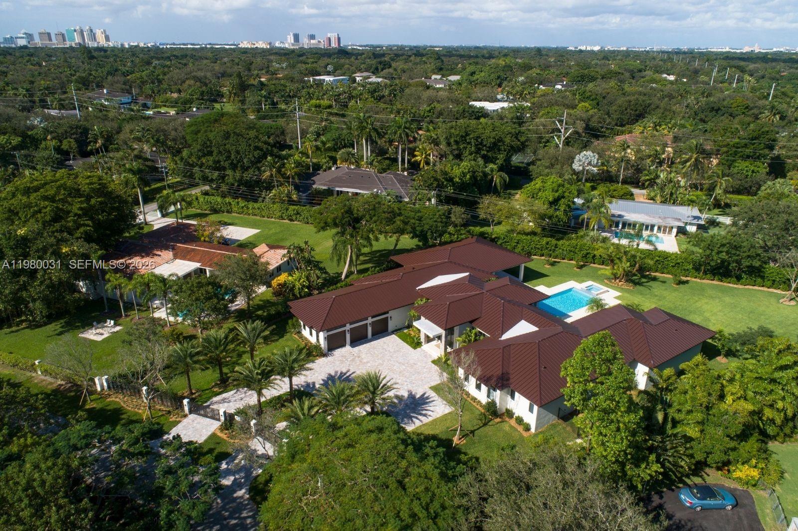 6065 Southwest 109th Street Pinecrest, FL 33156 - Photo 27 of 28 an aerial view of multiple house
