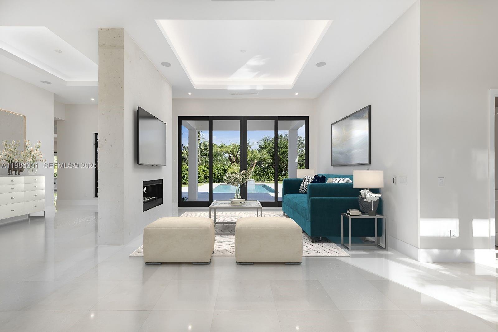 6065 Southwest 109th Street Pinecrest, FL 33156 - Photo 5 of 28 a bedroom with furniture and a large window