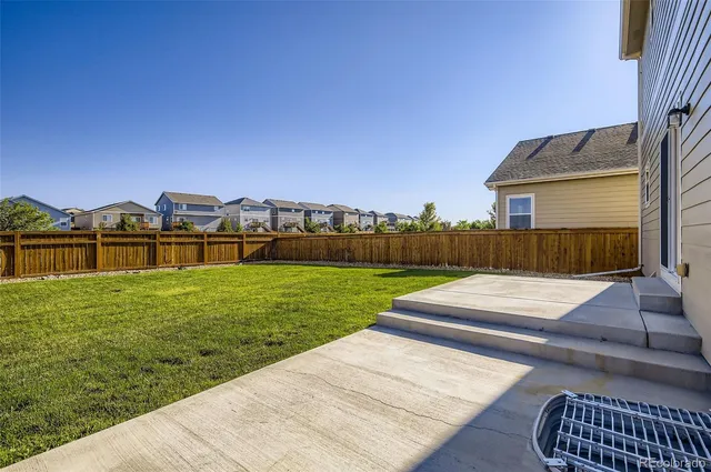 a view of a backyard with a garden