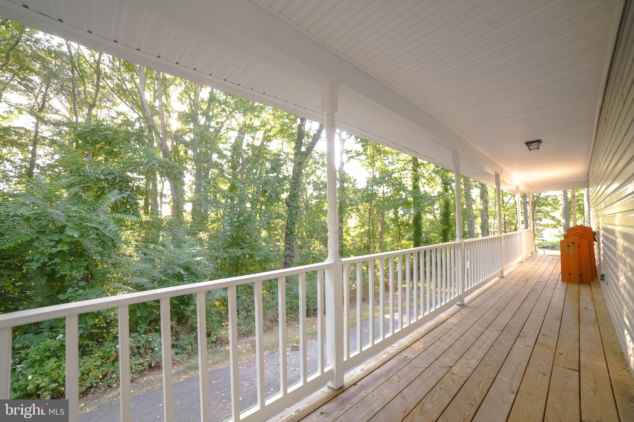 13630 Dowell Road Solomons, MD 20657 - Photo 4 of 121 Wrap Around Porch Side