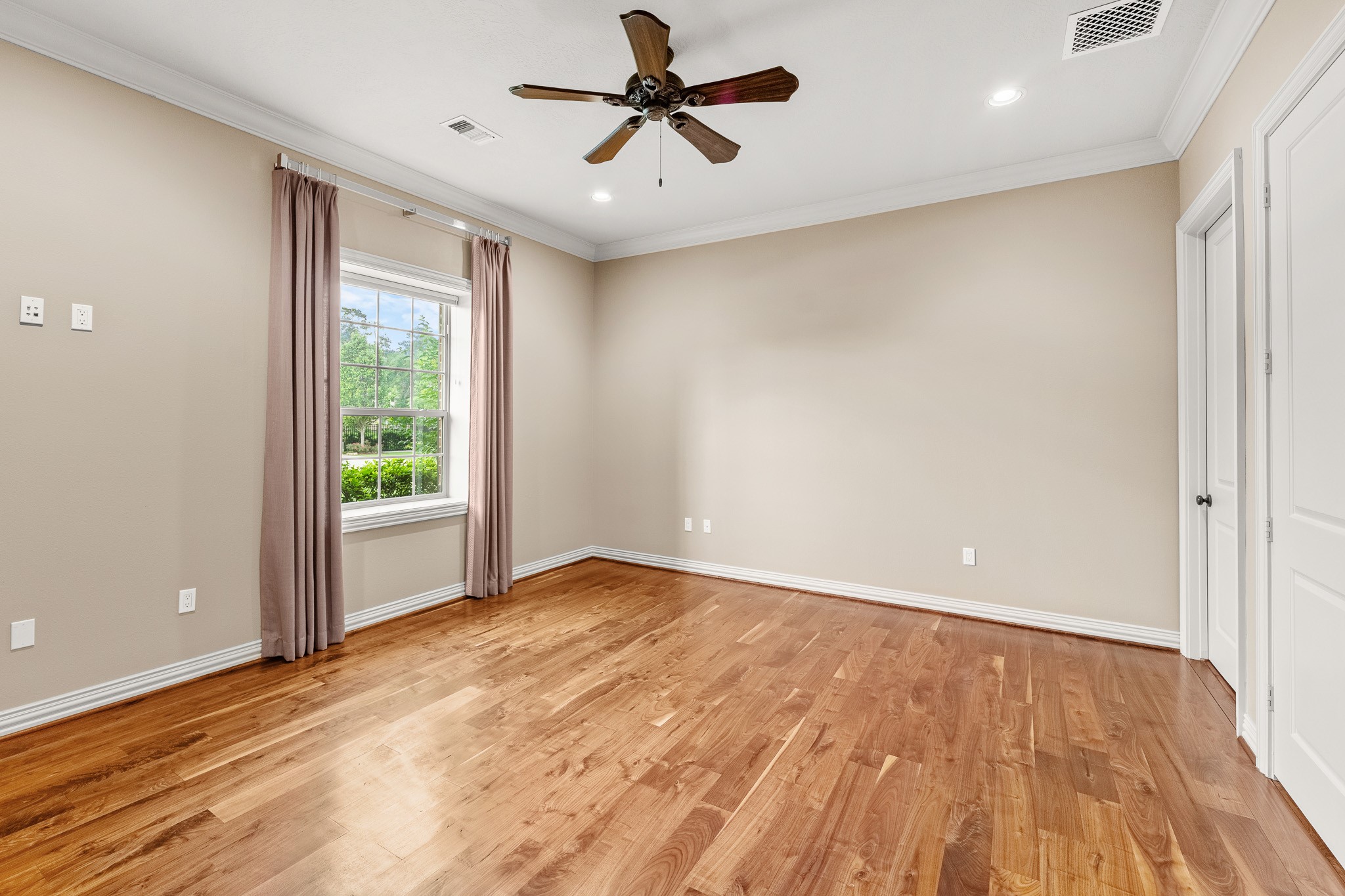 28002 Whispering Maple Way Spring, TX 77386 - Photo 36 of 44 wooden floor in an empty room with a window