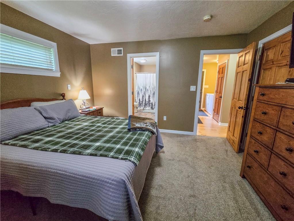 277 Dunn Road Greensburg, PA 15601 - Photo 13 of 24 a bedroom with a bed and a dresser