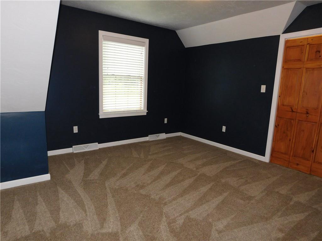277 Dunn Road Greensburg, PA 15601 - Photo 17 of 24 a view of an empty room with a window