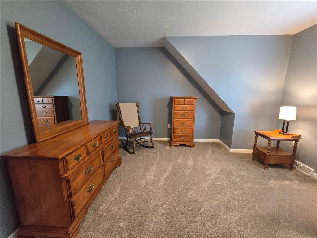 277 Dunn Road Greensburg, PA 15601 - Photo 18 of 24 a living room with furniture and a flat screen tv