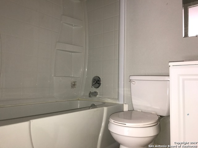 6551 Spring Time Street, Unit 304 San Antonio, TX 78249 - Photo 9 of 9 a bathroom with a sink and toilet