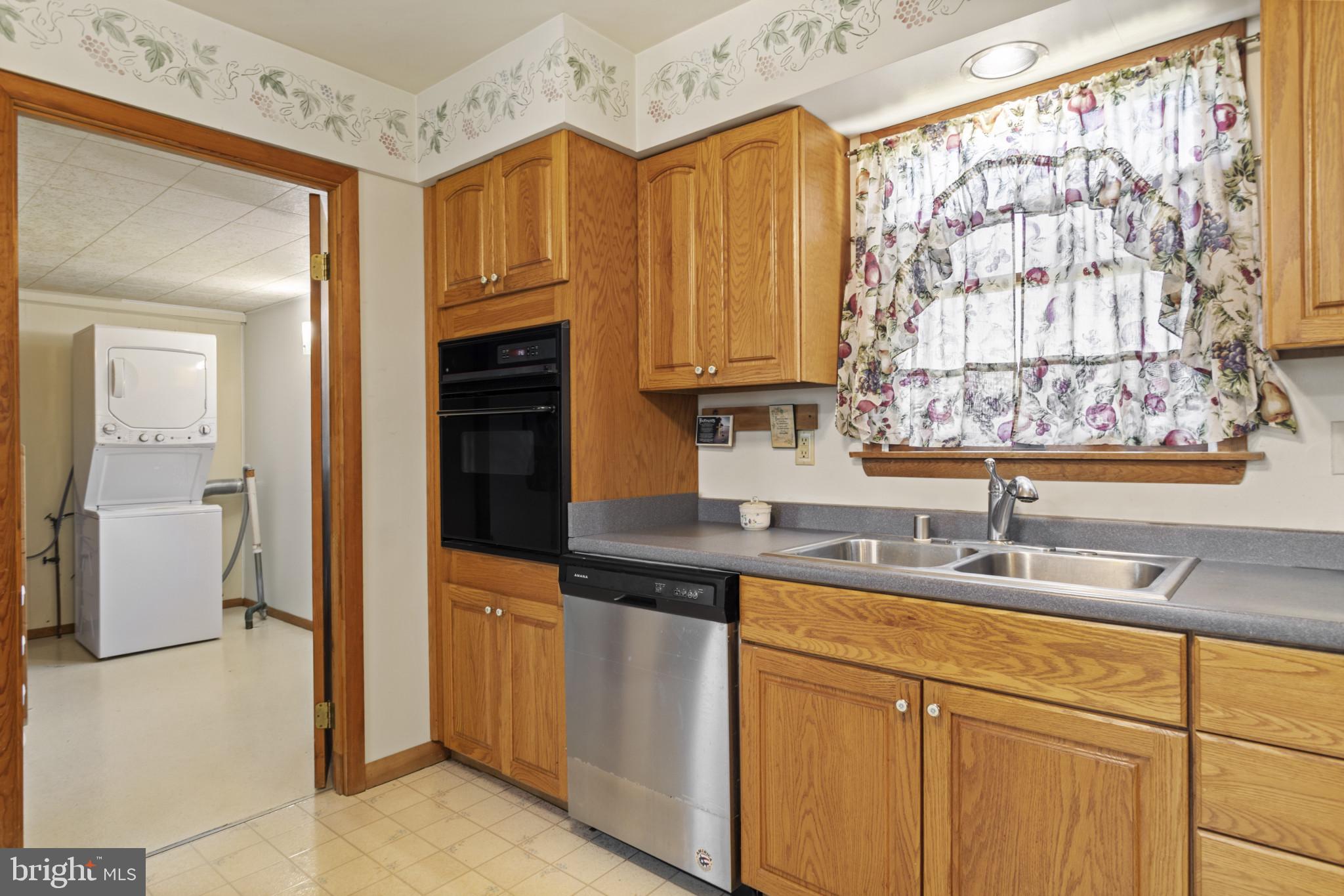 4114 Old Washington Road Westminster, MD 21157 - Photo 13 of 34 a kitchen with a sink cabinets and window