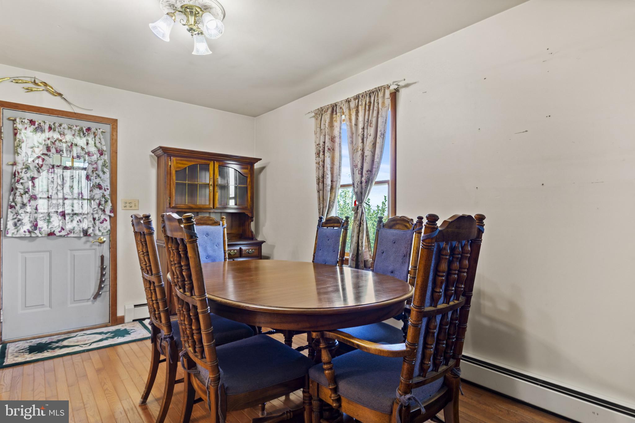 4114 Old Washington Road Westminster, MD 21157 - Photo 15 of 34 a view of a dining room with furniture and window