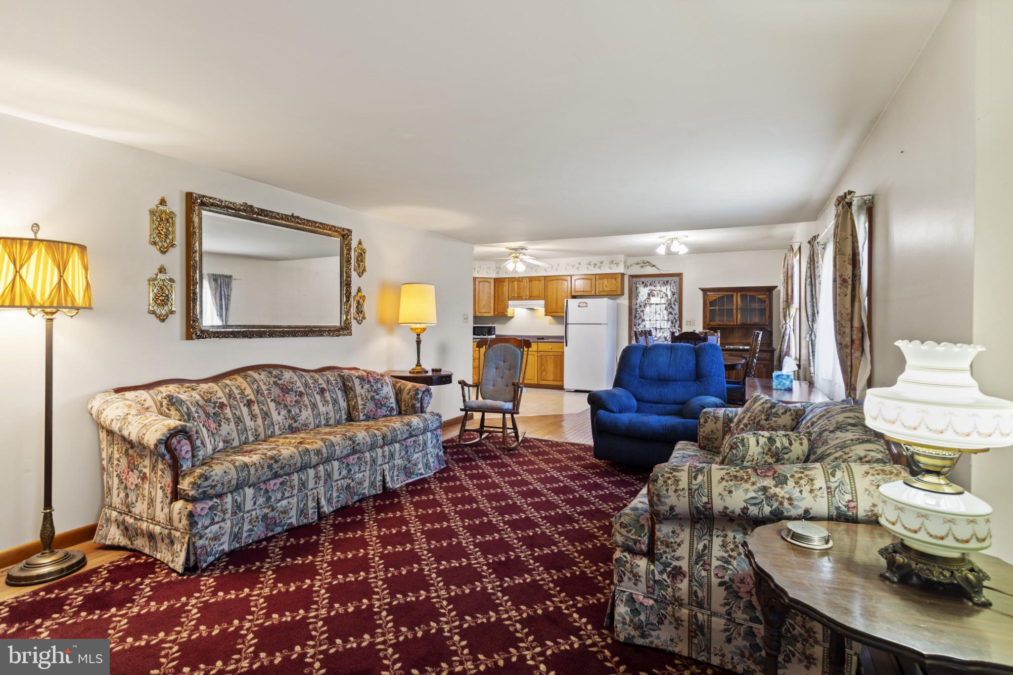 4114 Old Washington Road Westminster, MD 21157 - Photo 17 of 34 a living room with furniture and a flat screen tv