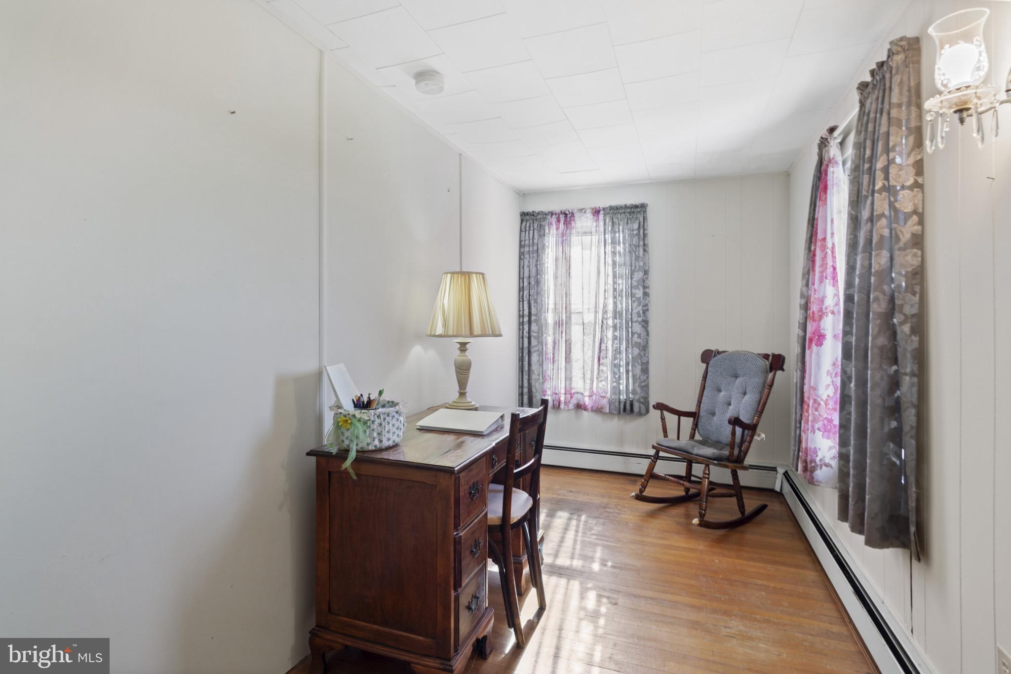 4114 Old Washington Road Westminster, MD 21157 - Photo 24 of 34 a view of a workspace with furniture and a window