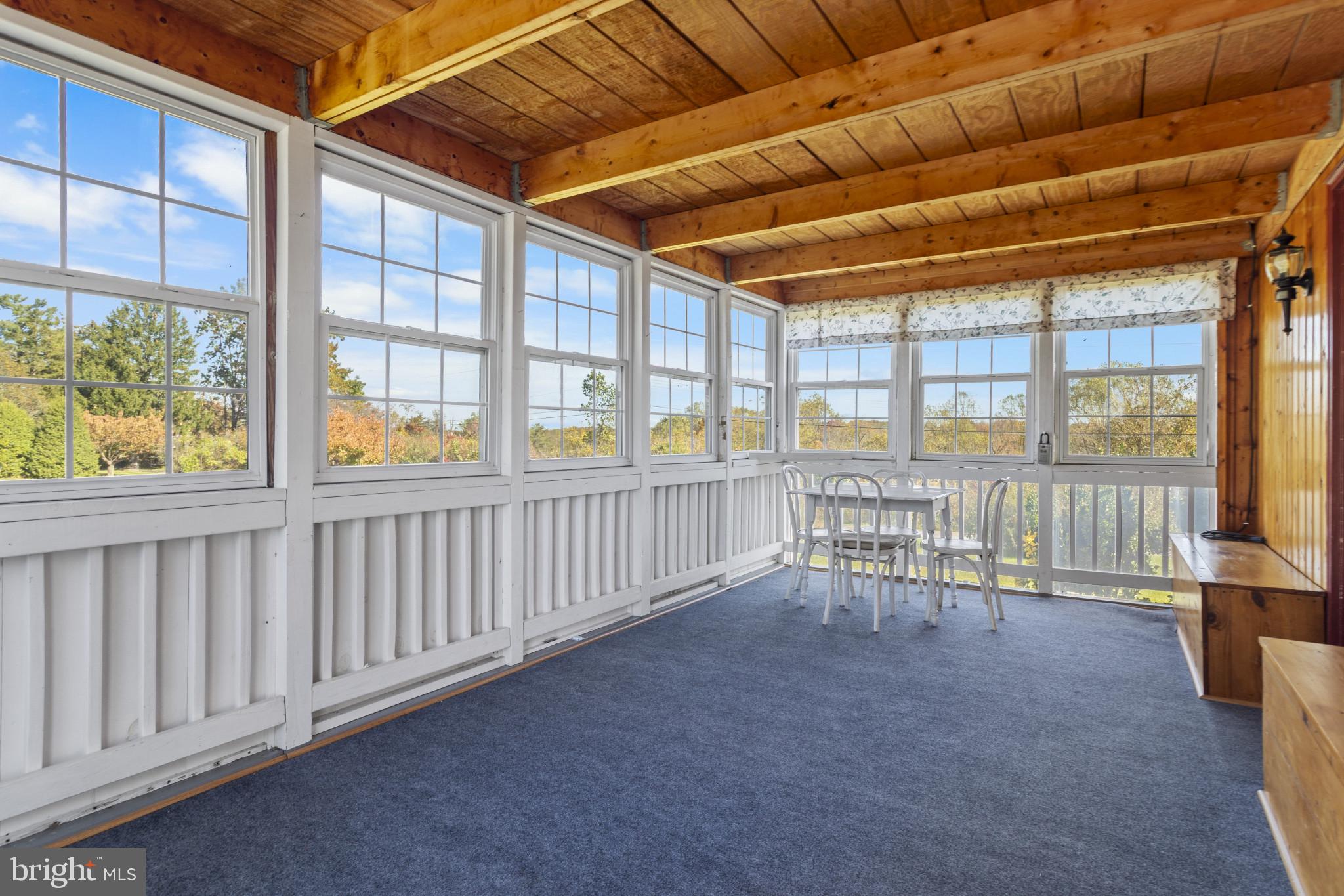 4114 Old Washington Road Westminster, MD 21157 - Photo 8 of 34 a view of a chairs and table in a patio
