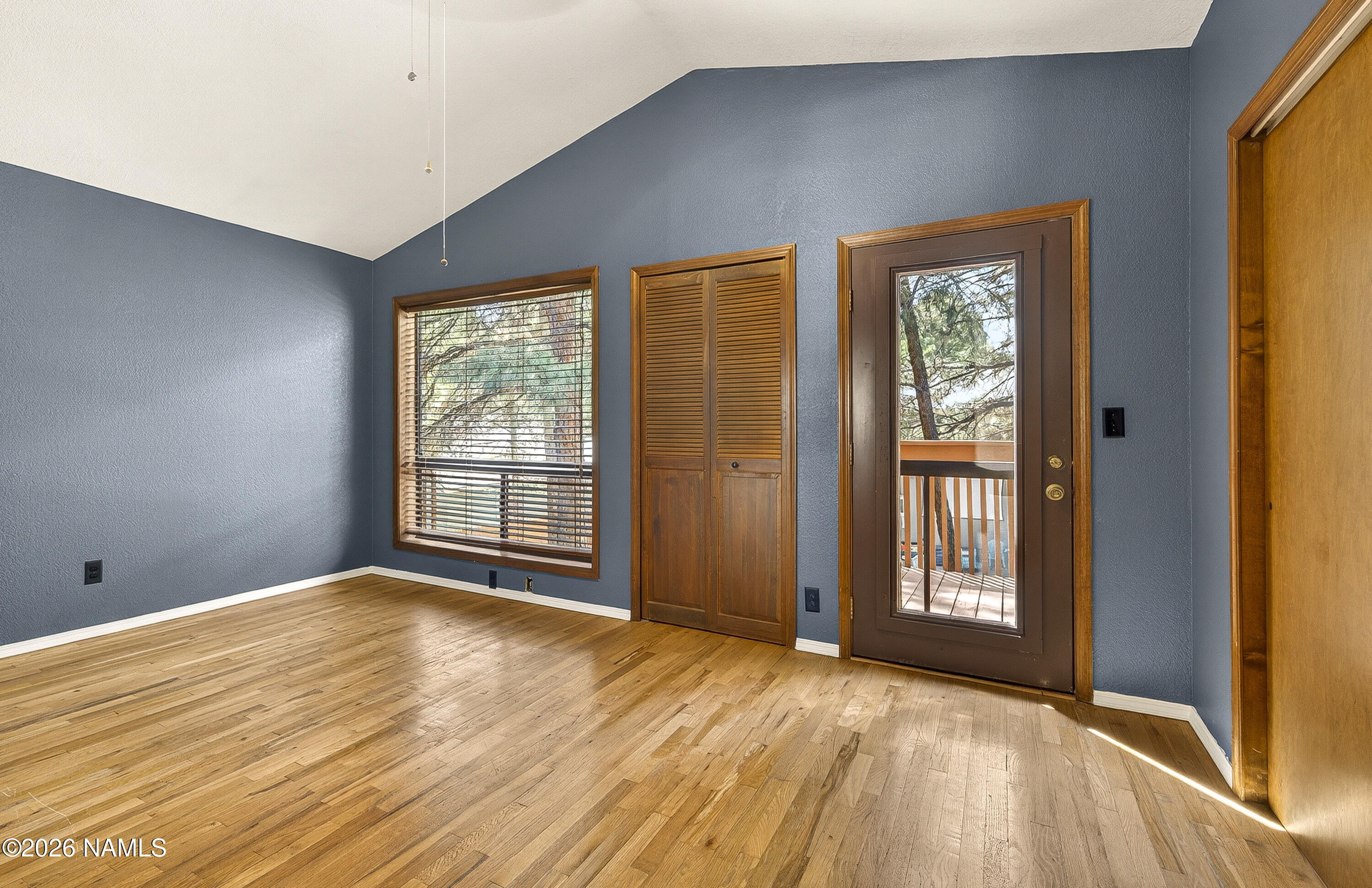 4005 South Lake Mary Road, Unit 9 Flagstaff, AZ 86005 - Photo 19 of 31 a view of an empty room with a window