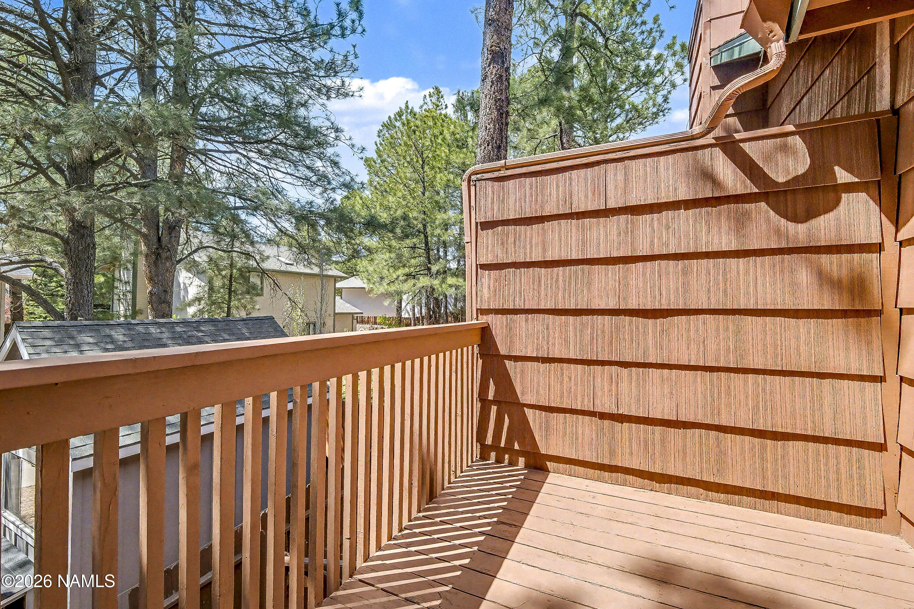 4005 South Lake Mary Road, Unit 9 Flagstaff, AZ 86005 - Photo 21 of 31 a balcony view with an outdoor space