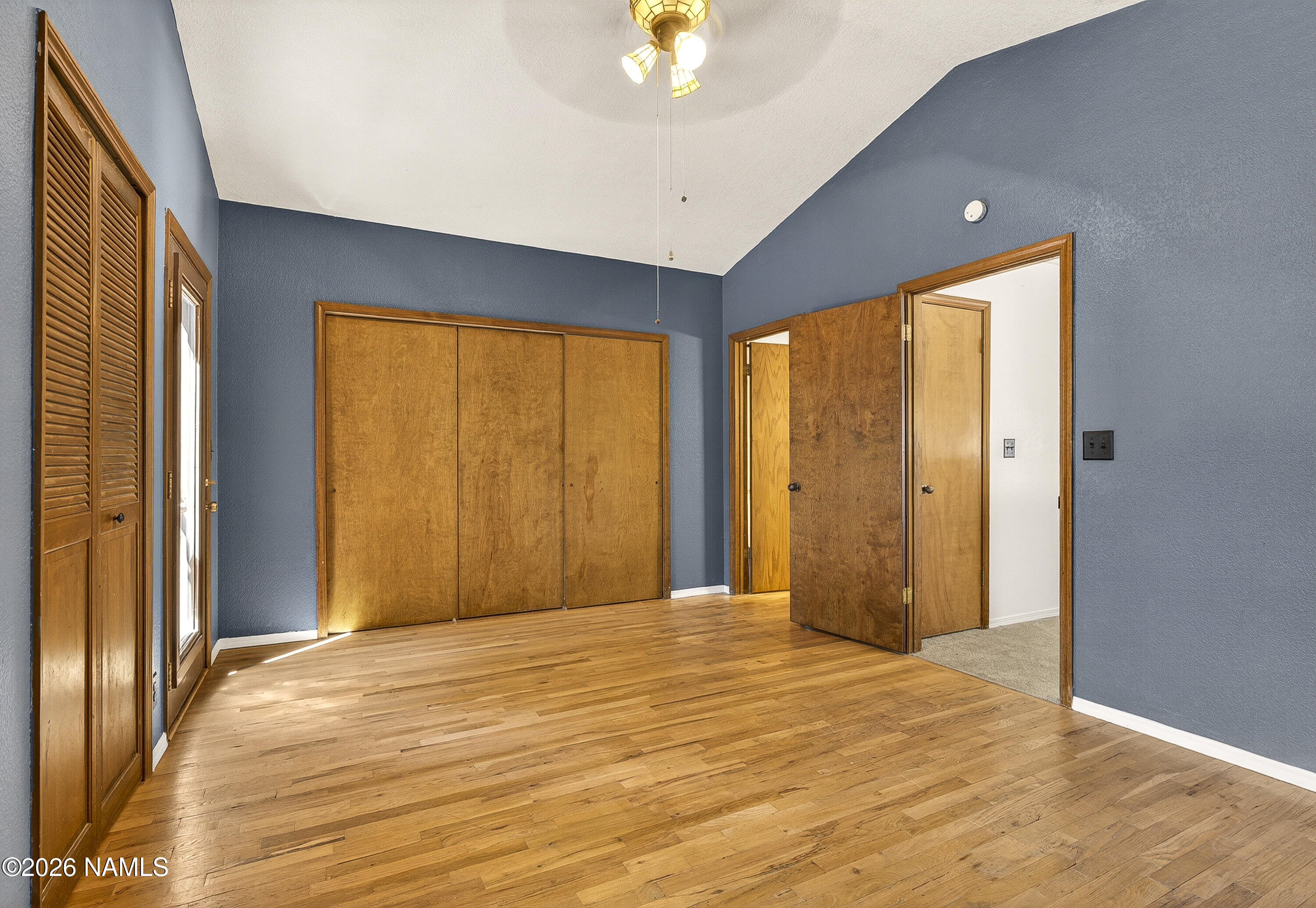 4005 South Lake Mary Road, Unit 9 Flagstaff, AZ 86005 - Photo 22 of 31 a view of an empty room with a window