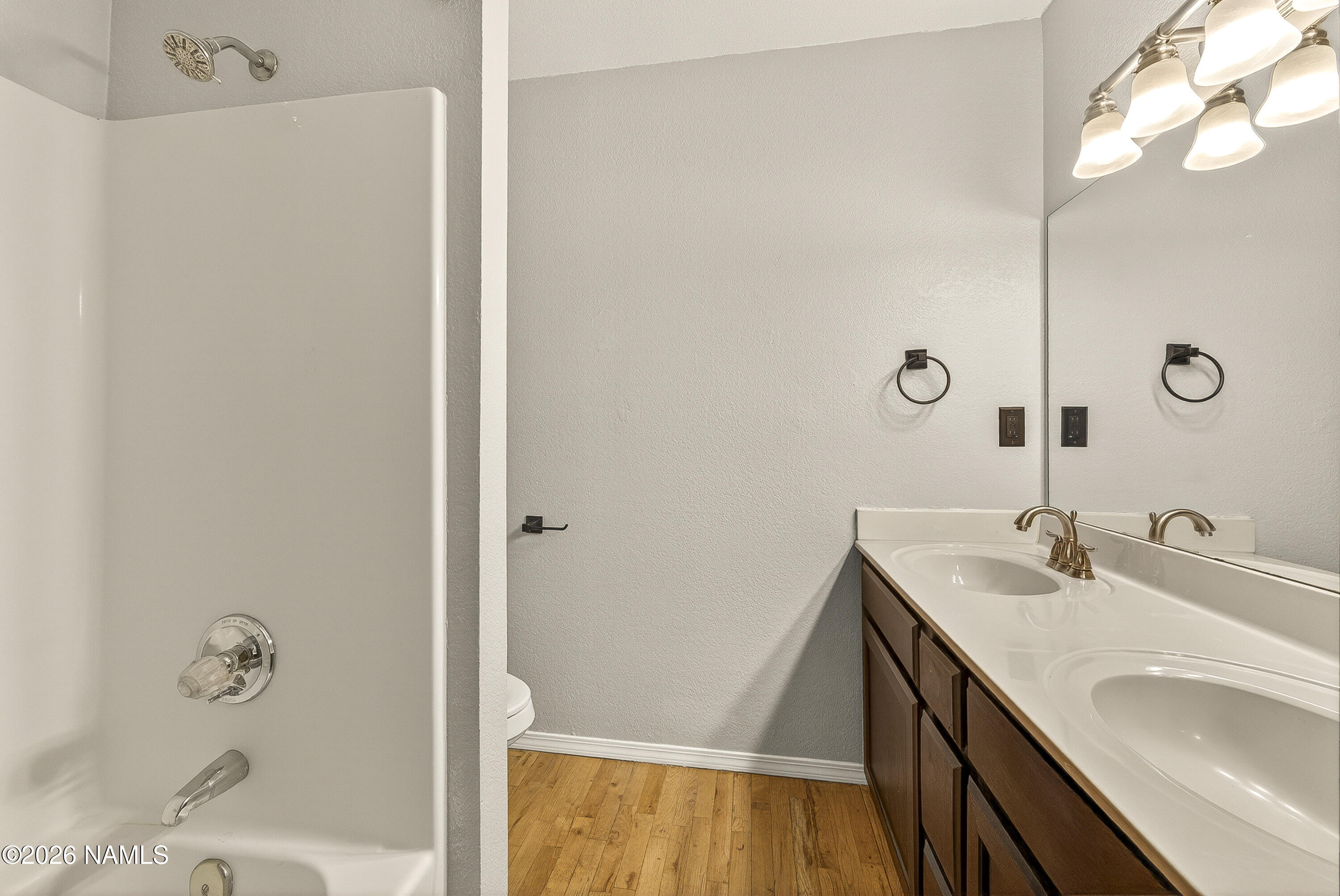 4005 South Lake Mary Road, Unit 9 Flagstaff, AZ 86005 - Photo 25 of 31 a bathroom with a sink and a mirror