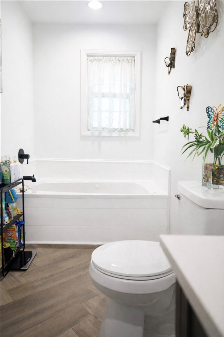9432 Highway 81 Iva, SC 29655 - Photo 15 of 19 This bathroom offers a relaxing soaking tub and durable tile flooring for everyday comfort.