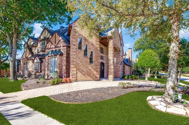 a view of a building with a yard