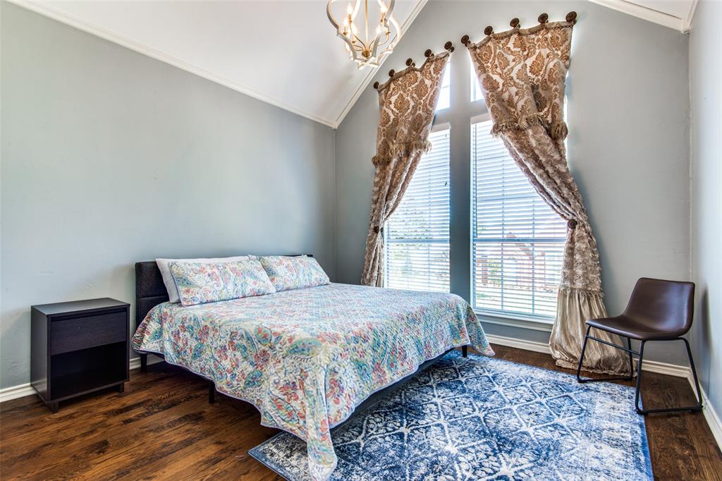 3400 Snidow Drive Plano, TX 75025 - Photo 23 of 25 a bedroom with a bed and a window