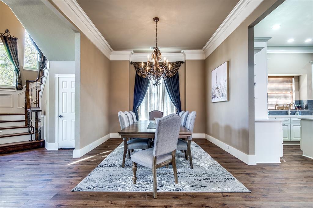 3400 Snidow Drive Plano, TX 75025 - Photo 10 of 25 a view of a dining room with furniture window and wooden floor