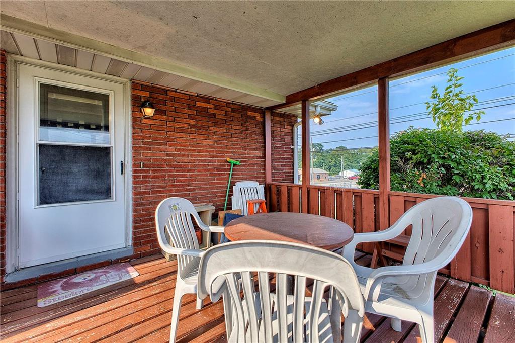 501 Ridgeview Road Mount Pleasant, PA 15666 - Photo 26 of 35 a view of a dining room with furniture window and wooden floor