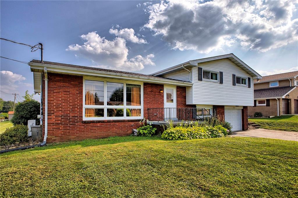 501 Ridgeview Road Mount Pleasant, PA 15666 - Photo 35 of 35 a front view of a house with garden