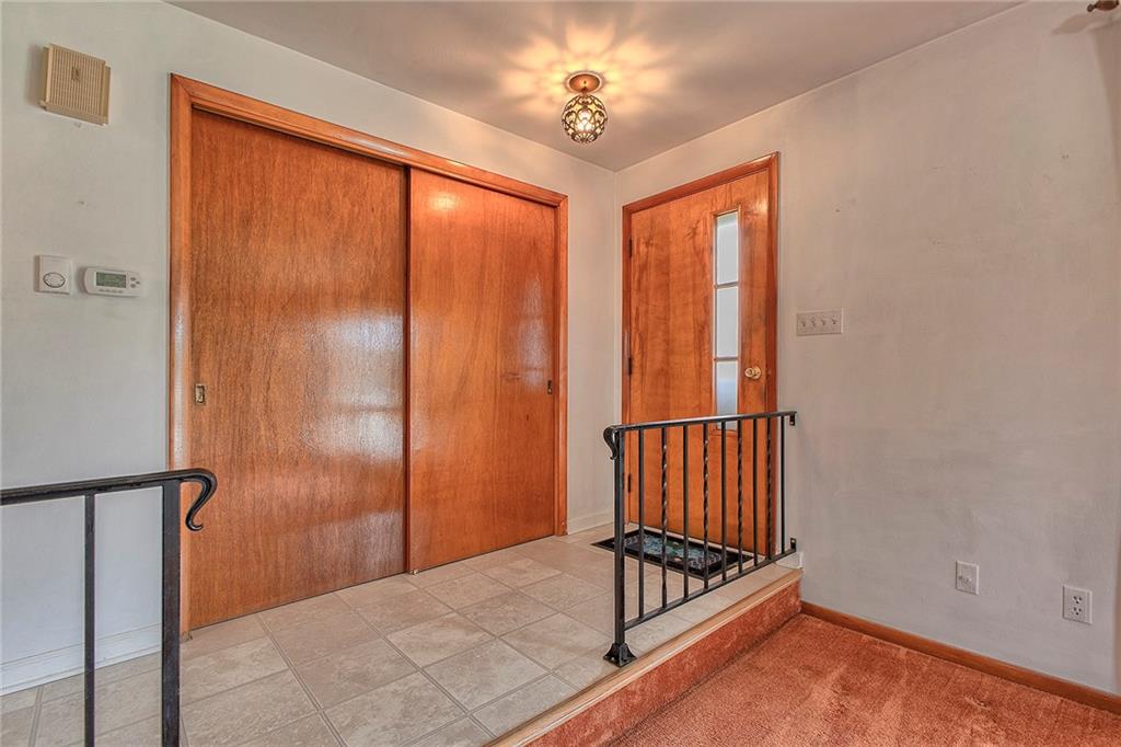 501 Ridgeview Road Mount Pleasant, PA 15666 - Photo 4 of 35 a view of room with window and stairs
