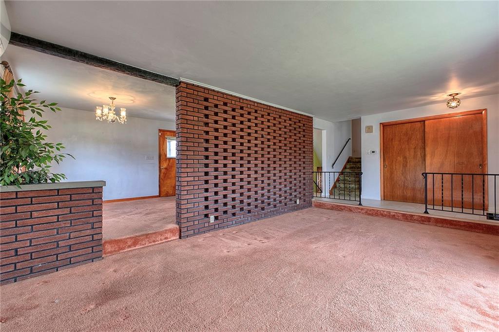 501 Ridgeview Road Mount Pleasant, PA 15666 - Photo 6 of 35 a view of an empty room with a garage