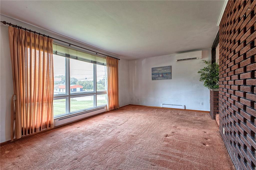 501 Ridgeview Road Mount Pleasant, PA 15666 - Photo 7 of 35 an empty room with windows