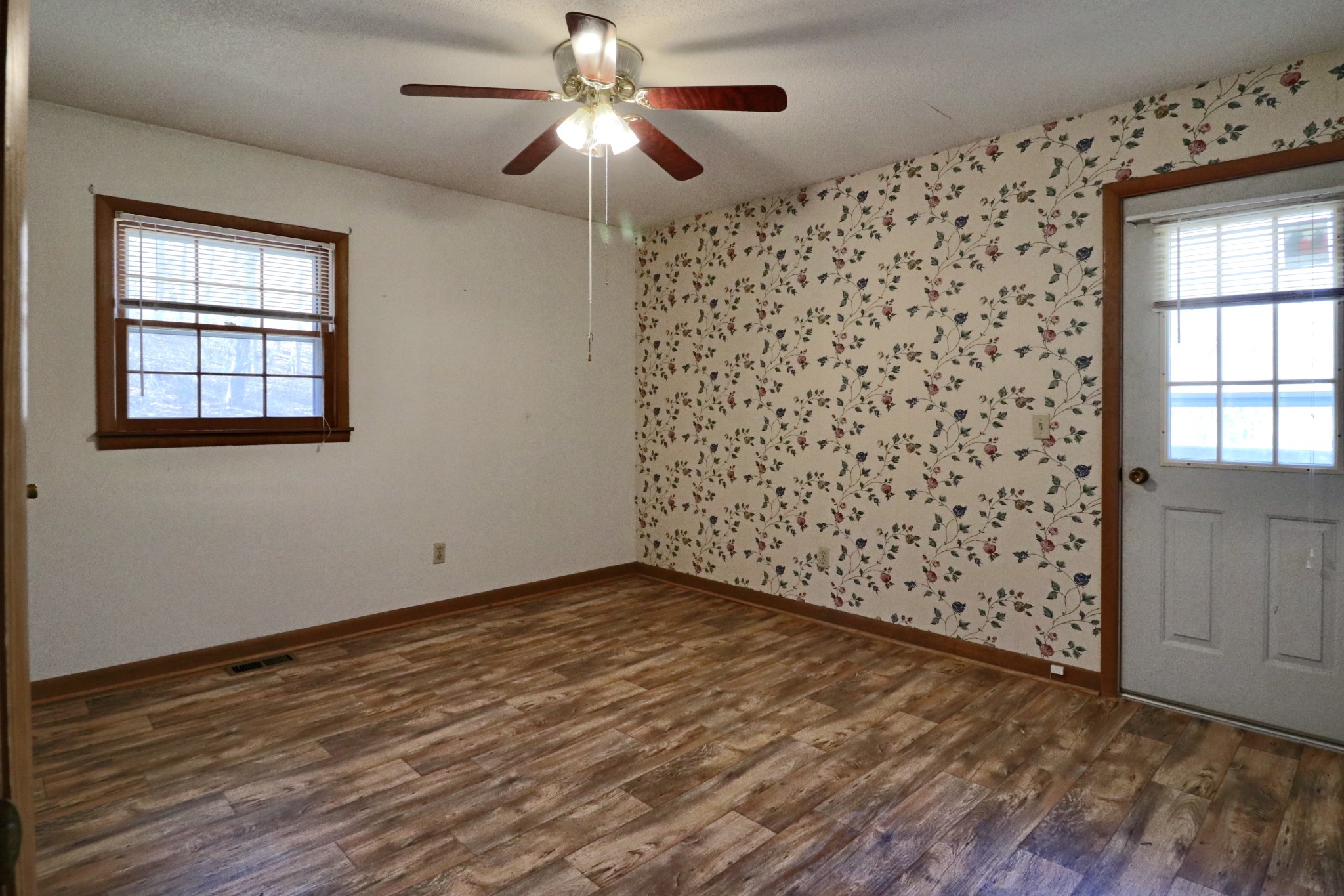 241 Mockerson Road Leoma, TN 38468 - Photo 33 of 43 wooden floor in an empty room with a window