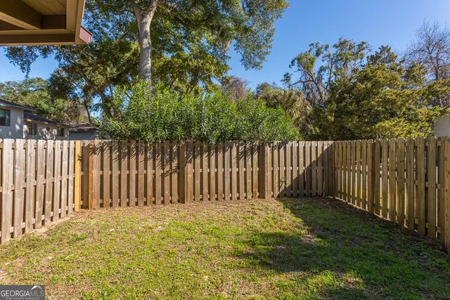 a view of a wooden fence