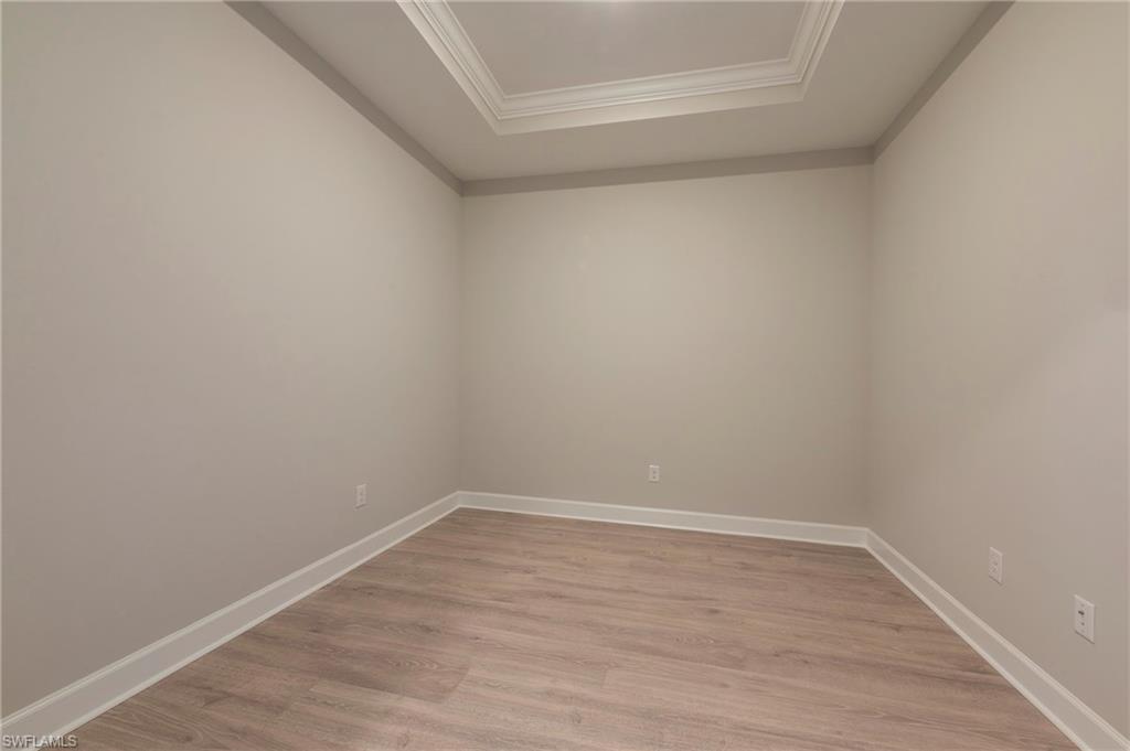 15633 Gavello Street Naples, FL 34114 - Photo 18 of 37 a view of an empty room
