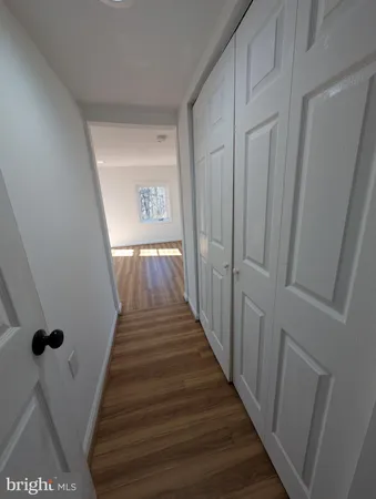 a view of a hallway view with staircase