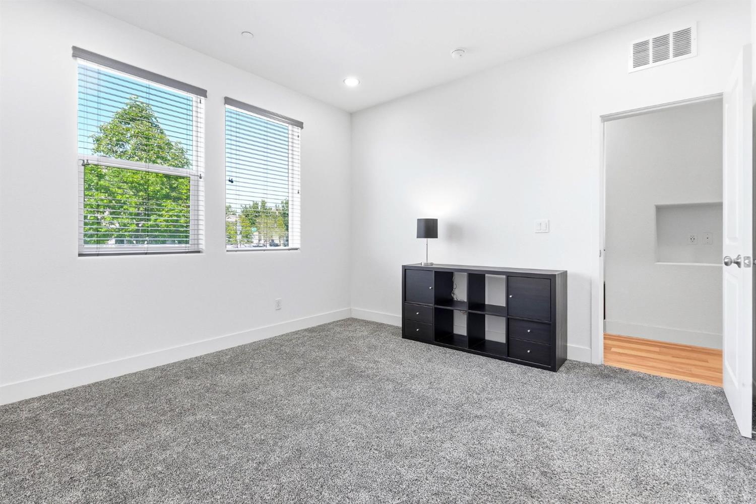 2564 Prosper Road Sacramento, CA 95834 - Photo 7 of 46 an empty room with windows