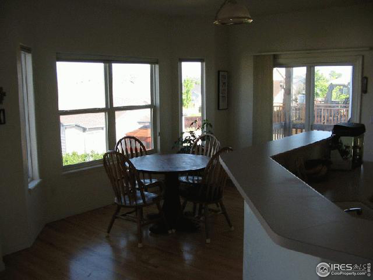 628 Rider Ridge Drive Longmont, CO 80504 - Photo 6 of 9 a dining room with furniture and window