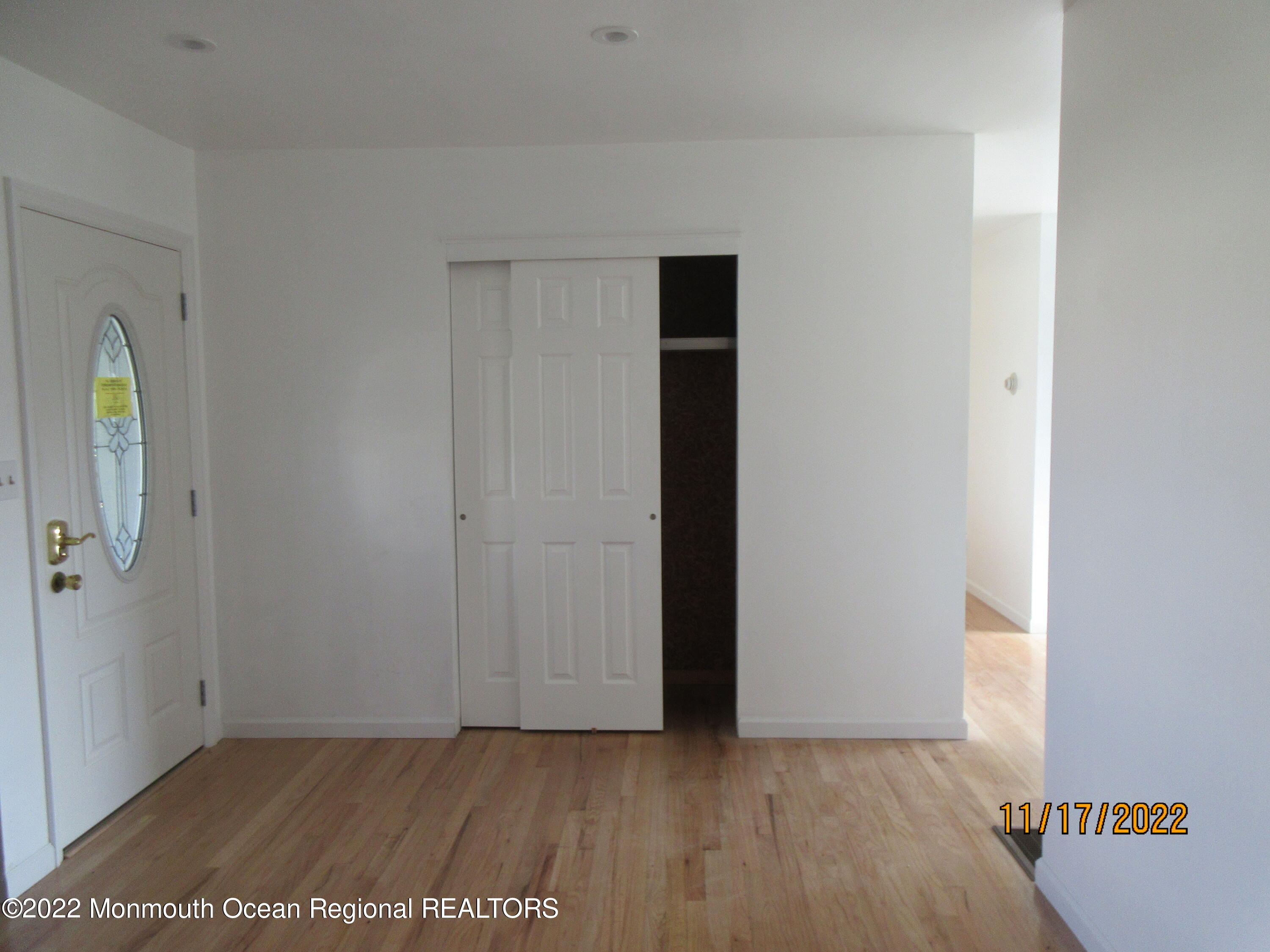 28 New Friendship Road Howell, NJ 07731 - Photo 14 of 29 a view of an empty room with wooden floor