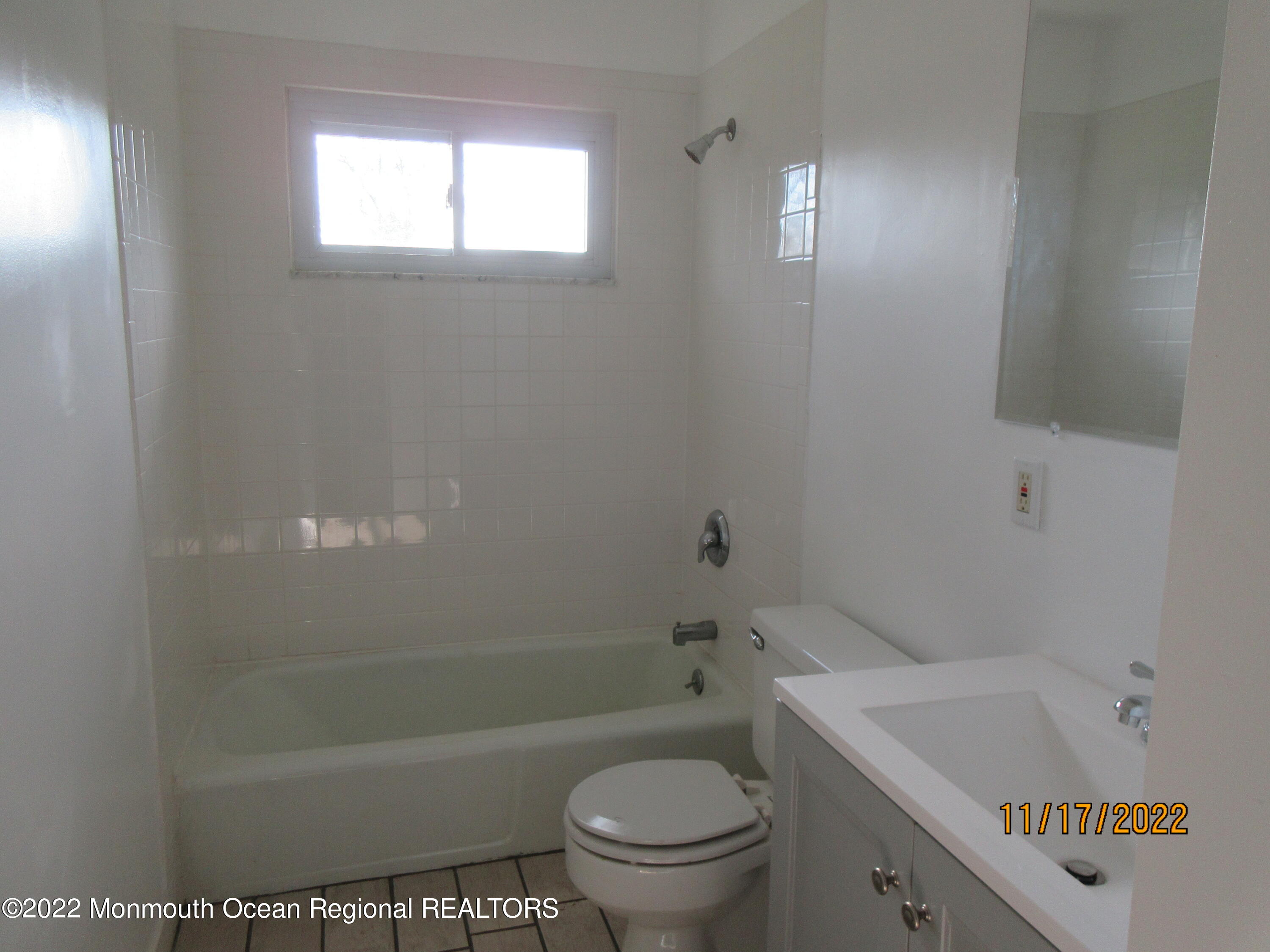 28 New Friendship Road Howell, NJ 07731 - Photo 17 of 29 a bathroom with a sink a toilet and bathtub