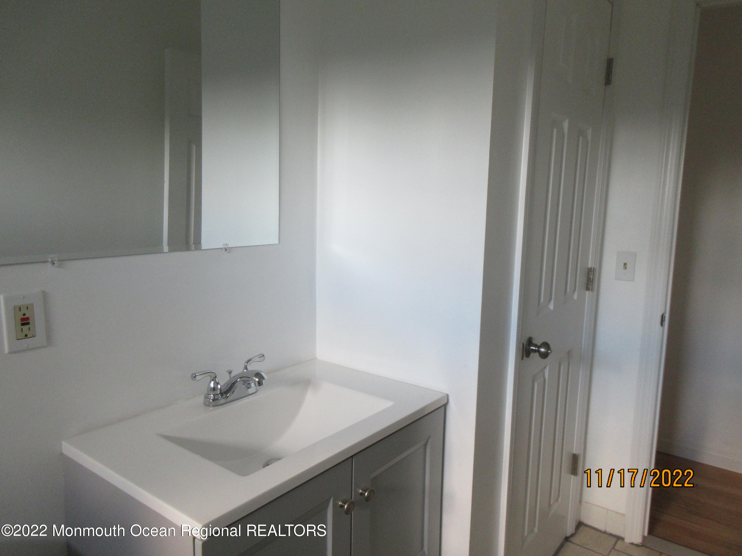 28 New Friendship Road Howell, NJ 07731 - Photo 19 of 29 a bathroom with a sink vanity and toilet