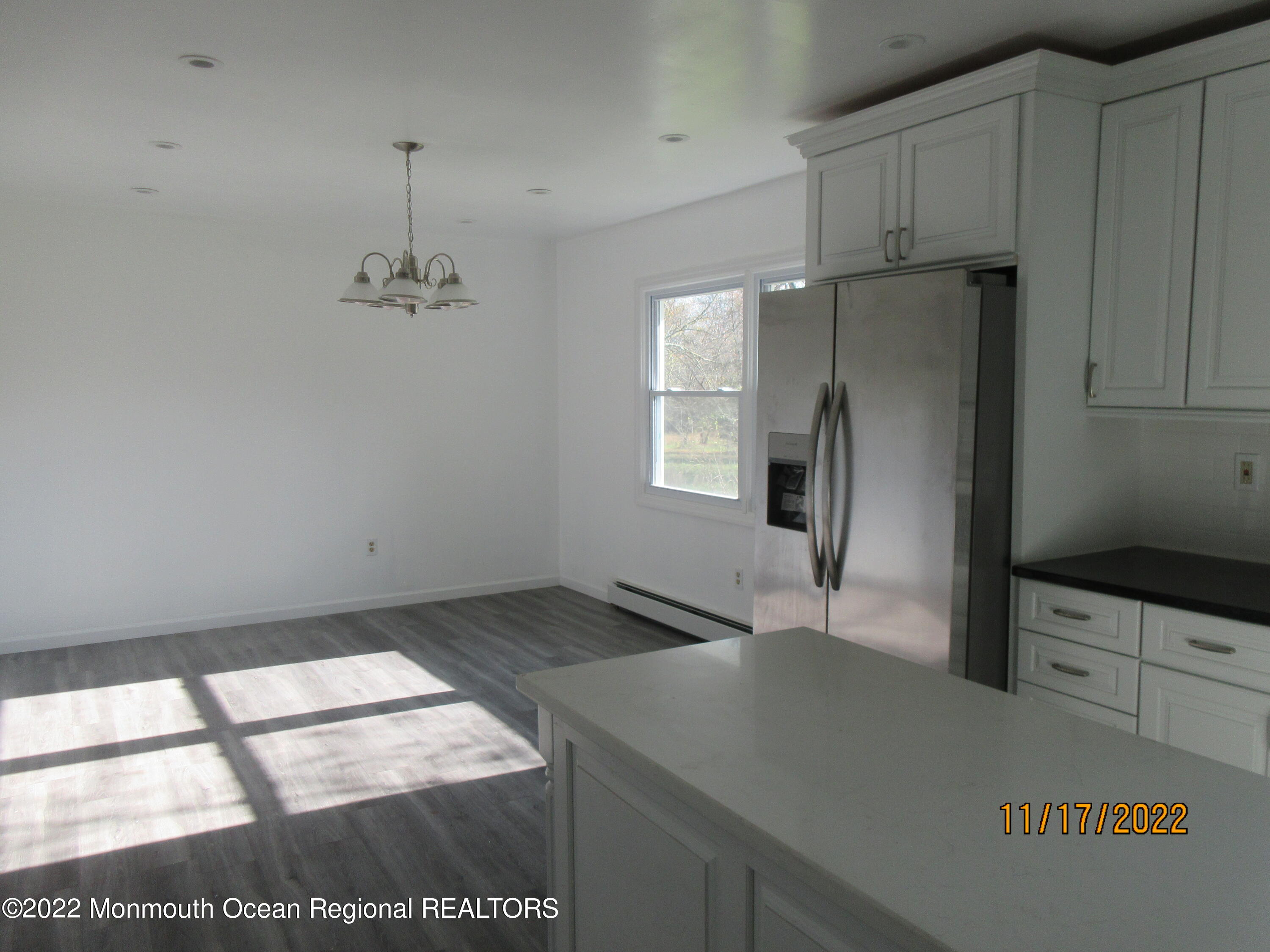 28 New Friendship Road Howell, NJ 07731 - Photo 7 of 29 a kitchen with stainless steel appliances granite countertop a refrigerator and a sink