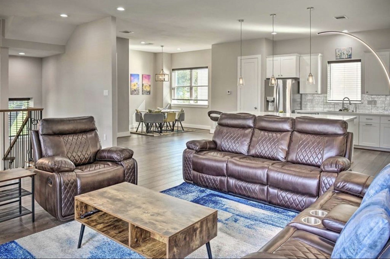 6403 Bowling Green Street Houston, TX 77021 - Photo 2 of 31 a living room with furniture and wooden floor