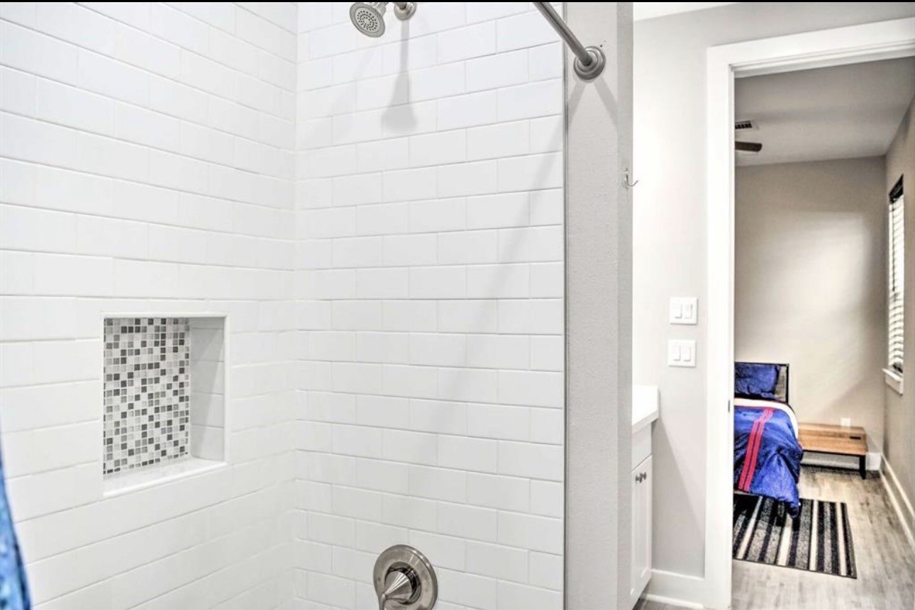 6403 Bowling Green Street Houston, TX 77021 - Photo 21 of 31 a bathroom with a shower