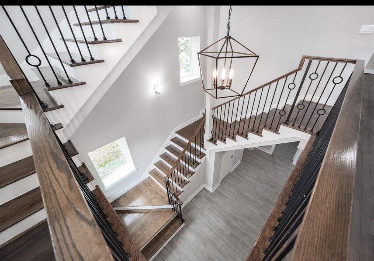 6403 Bowling Green Street Houston, TX 77021 - Photo 7 of 31 a view of entryway and hall with wooden floor