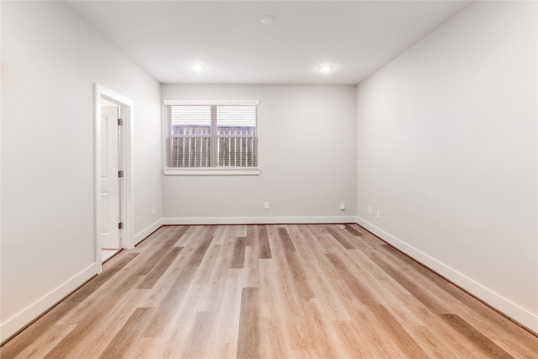 1250 North Post Oak Road, Unit C Houston, TX 77055 - Photo 2 of 31 Versatile downstairs room ideal as a bedroom or home office.