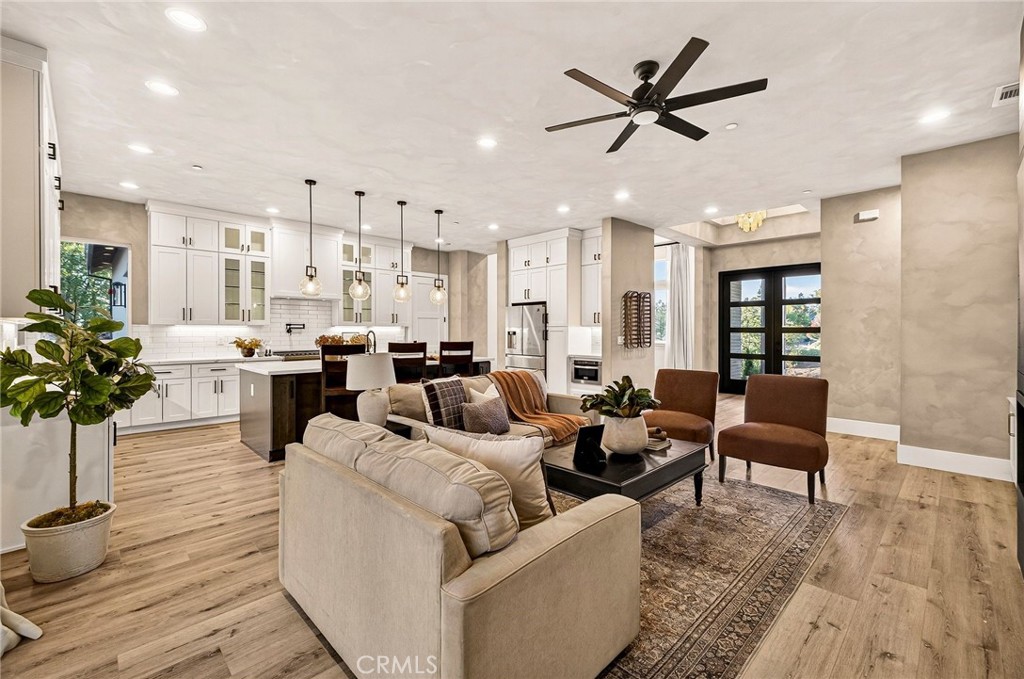 5772 Acorn Ridge Drive Paradise, CA 95969 - Photo 15 of 59 a living room with furniture kitchen view and a chandelier