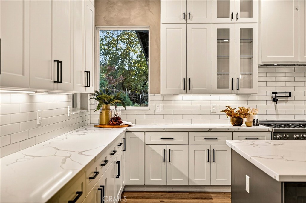5772 Acorn Ridge Drive Paradise, CA 95969 - Photo 18 of 59 a kitchen with stainless steel appliances white cabinets and a sink