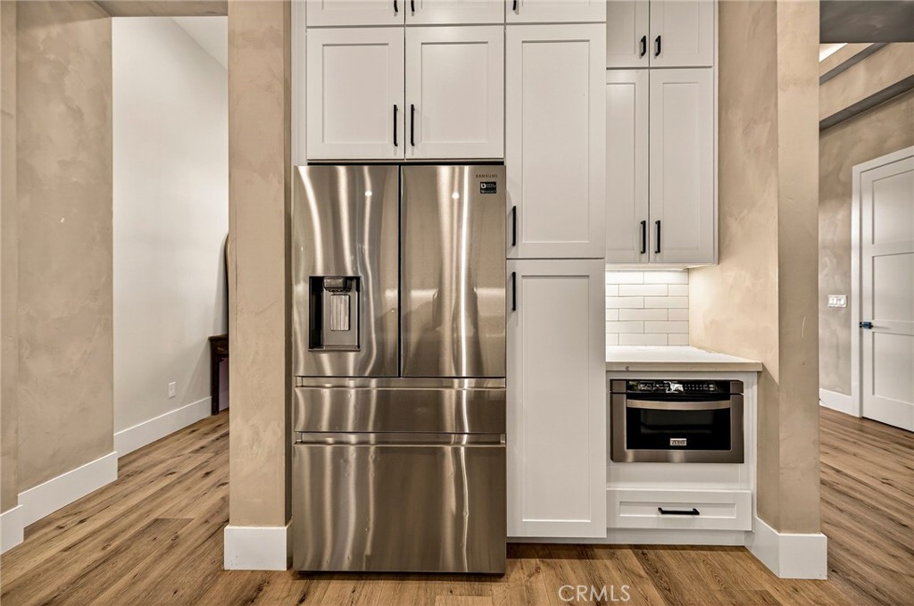 5772 Acorn Ridge Drive Paradise, CA 95969 - Photo 21 of 59 a kitchen with a refrigerator and cabinets