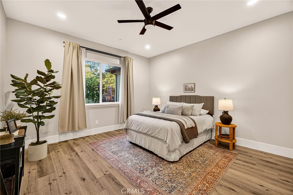 5772 Acorn Ridge Drive Paradise, CA 95969 - Photo 25 of 59 a bed sitting in a spacious bedroom next to a window