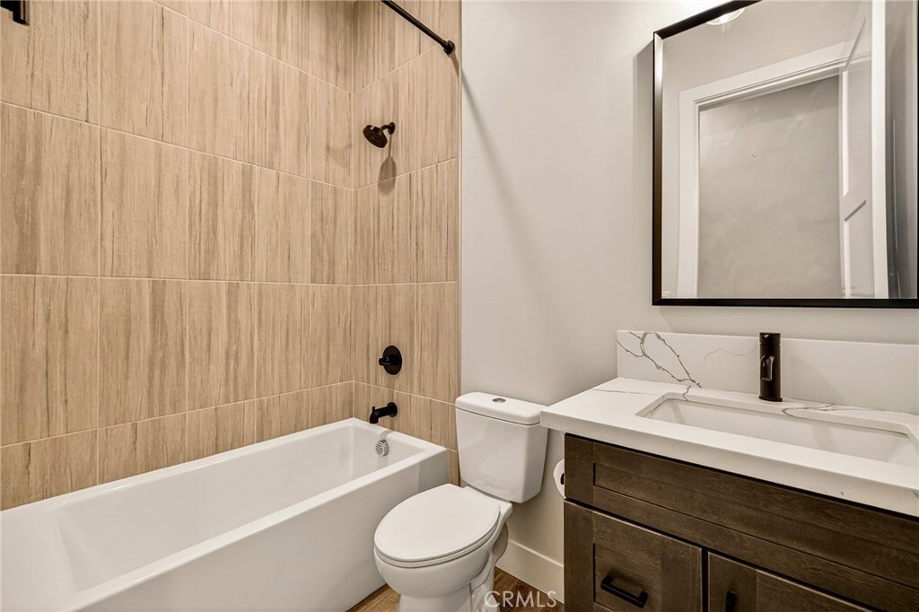 5772 Acorn Ridge Drive Paradise, CA 95969 - Photo 33 of 59 a bathroom with a sink a toilet a mirror and shower